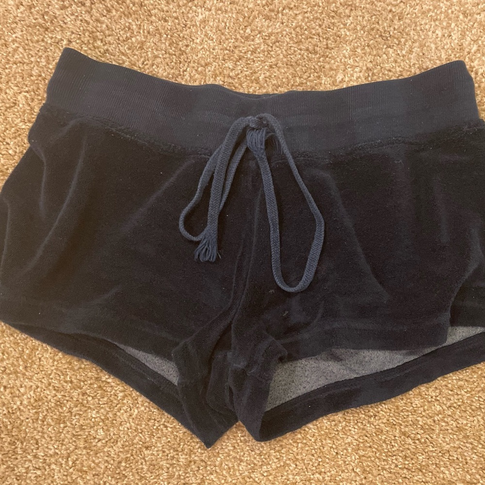 I am selling a medium pair of navy blue Hard Tail Shorts. Price is negotiable.